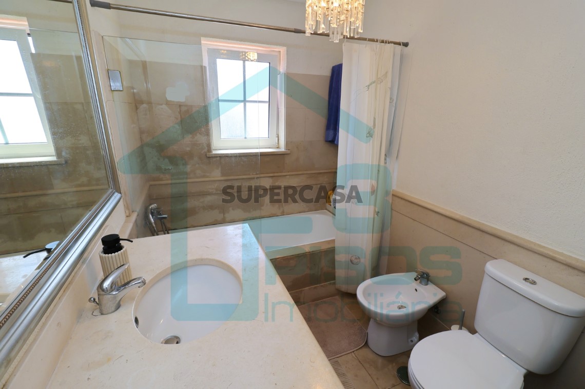 Bathrooms with window, bathtub and large worktop