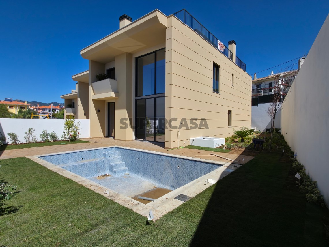 venda moradia jardim e piscina em Murches_Cluttons