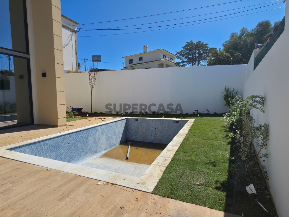 venda moradia jardim e piscina em Murches_Cluttons