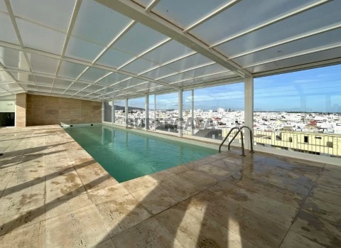 Apartamento T4 Contemporâneo com Piscina em Condomínio Exclusivo - Olhão